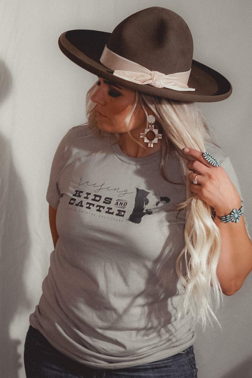 “Raising Kids and Cattle” Adult Unisex Western Graphic Tee in Stone