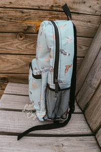 Cow Dogs Backpack in Turquoise